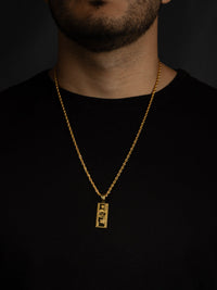 Cadena lazo 60 cms + dije dolar| Enchape de oro 18k