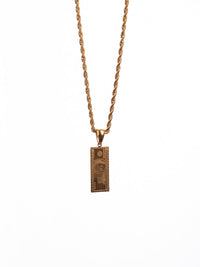 Cadena lazo 50 cms + dije dolar| Enchape de oro 18k