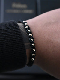Pulsera Aeternum Negro Oro Laminado 18K