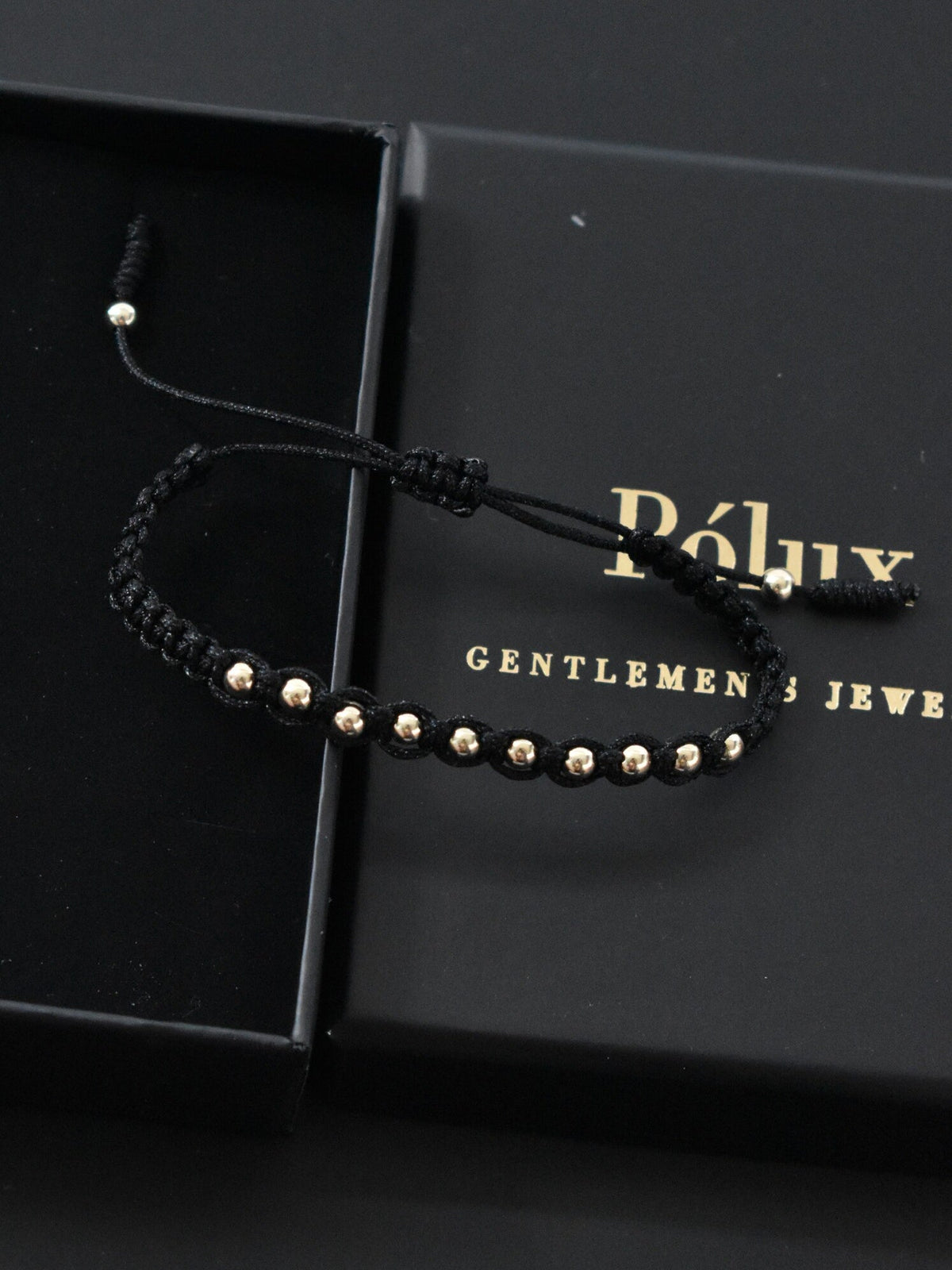 Pulsera Aeternum Negro Oro Laminado 18K