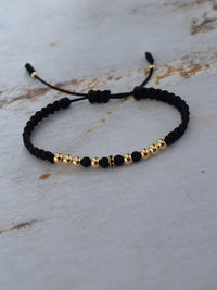 Pulsera Dominus Negro Oro Laminado 18K