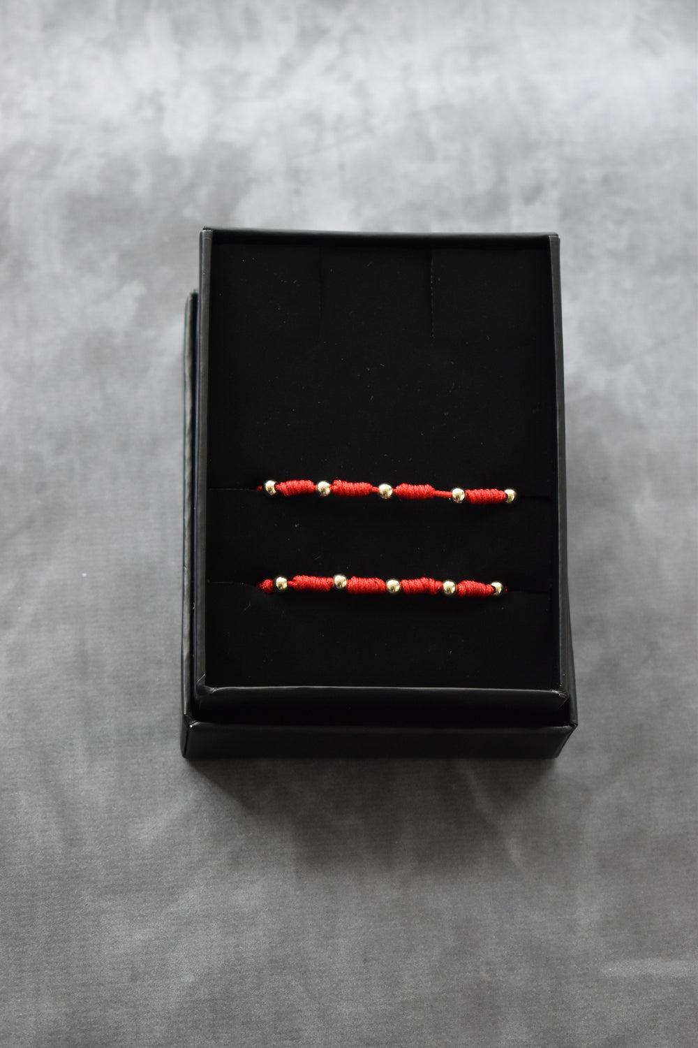 Pulseras Pareja 7 Nudos Oro Laminado 18K – Hilo Rojo