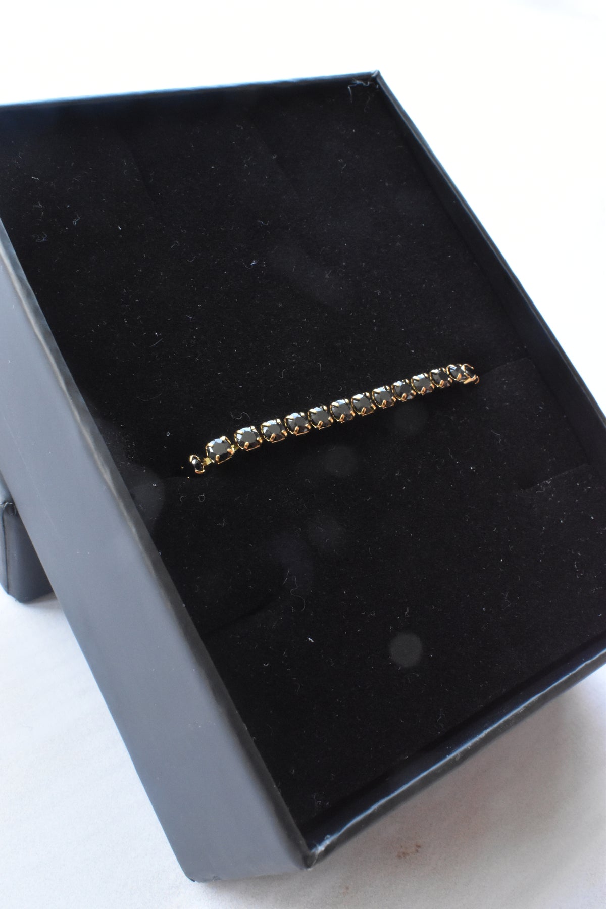 Pulsera tennis oro en empaque premium