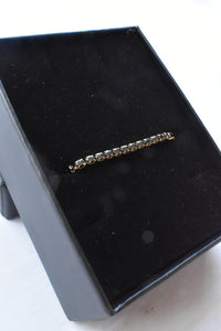 Pulsera tennis oro en empaque premium