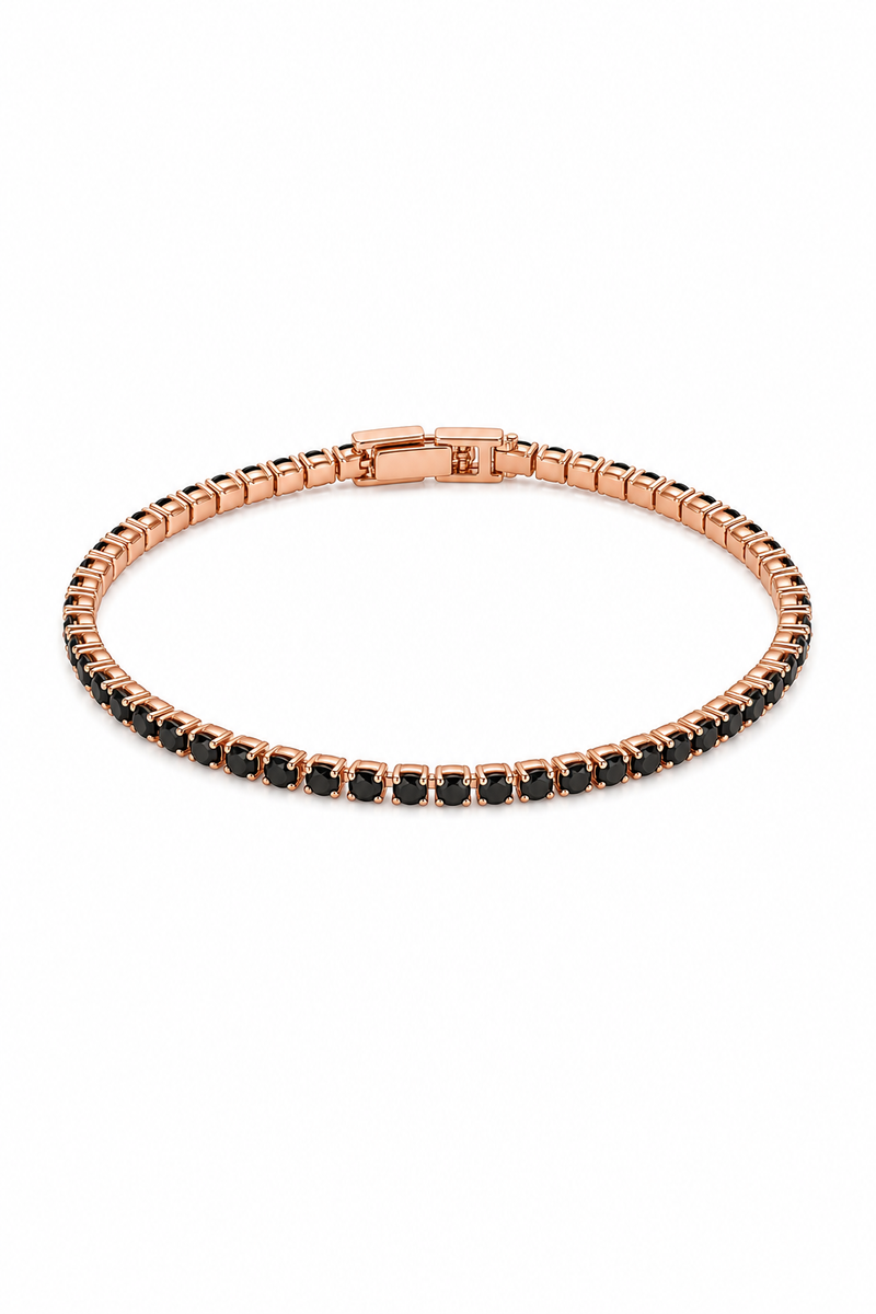 Pulsera tennis oro rosa circones negros tipo ónix fondo blanco