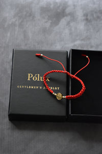 Pulsera Roja San Benito | Oro laminado 18 K - Imperium