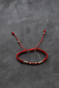 Pulsera roja Dominus | Oro laminado 18 K