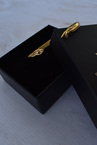 Pulsera ajustable hombre abertura extremos manos doradas acero quirúrgico
