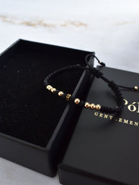 Pulsera Dominus Negro Oro Laminado 18K
