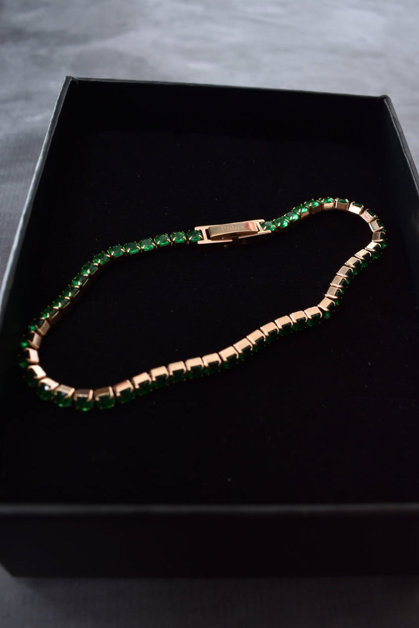 Pulsera tennis oro rosa circones verdes esmeralda acero quirúrgico