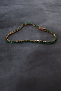 Pulsera tennis oro rosa circones verdes esmeralda acero quirúrgico