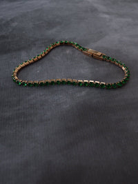 Pulsera tennis oro rosa circones verdes esmeralda acero quirúrgico