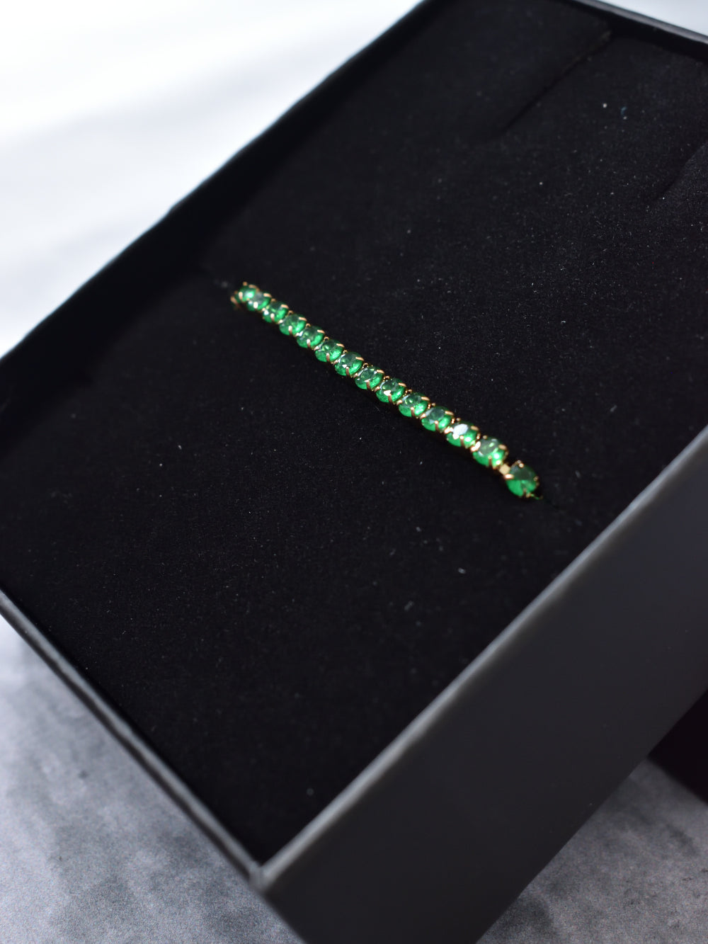 Detalle cierre pulsera tennis chapada oro rosa