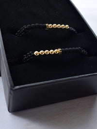 Set Pulseras Parejas Afrodita en empaque de lujo, vista superior