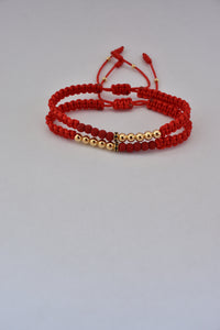 Set de 2 pulseras Afrodita rojas oro laminado 18K, vista en ángulo