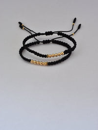 Set de 2 pulseras Afrodita oro laminado 18K, vista en ángulo